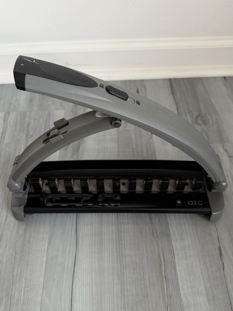 Staples Arc System Adjustable 11 Hole Punch