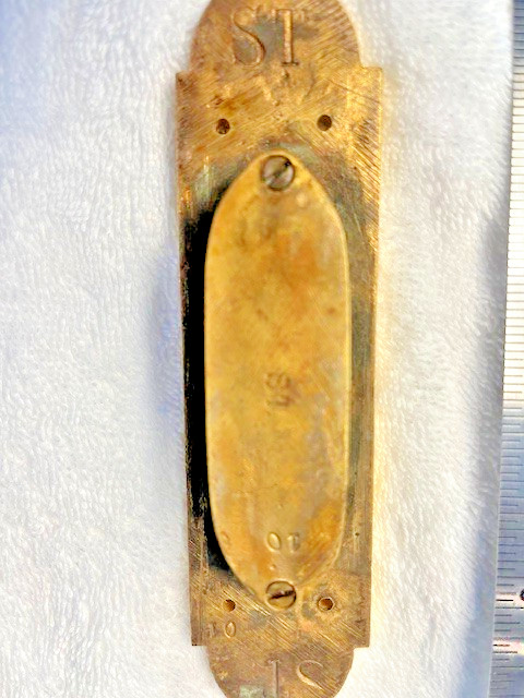 A fine antique gold pocket door pull by Bricard