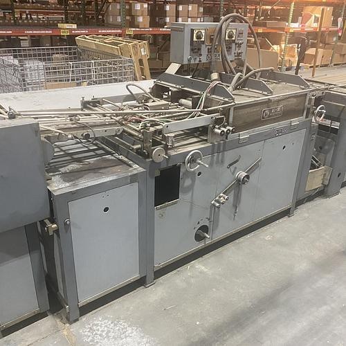 EZ MACHINE AUTO TABBING MACHINE.