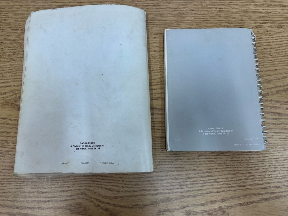 DeskMate TANDY USER REFERENCE MANUAL and DMP 132 Dot-Matrix Printer Manual.