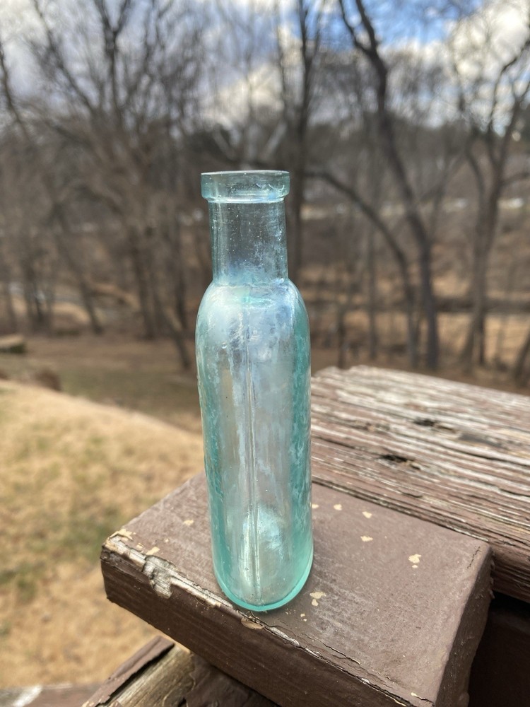 Week’s Snow Flake Blue Antique Bottle
