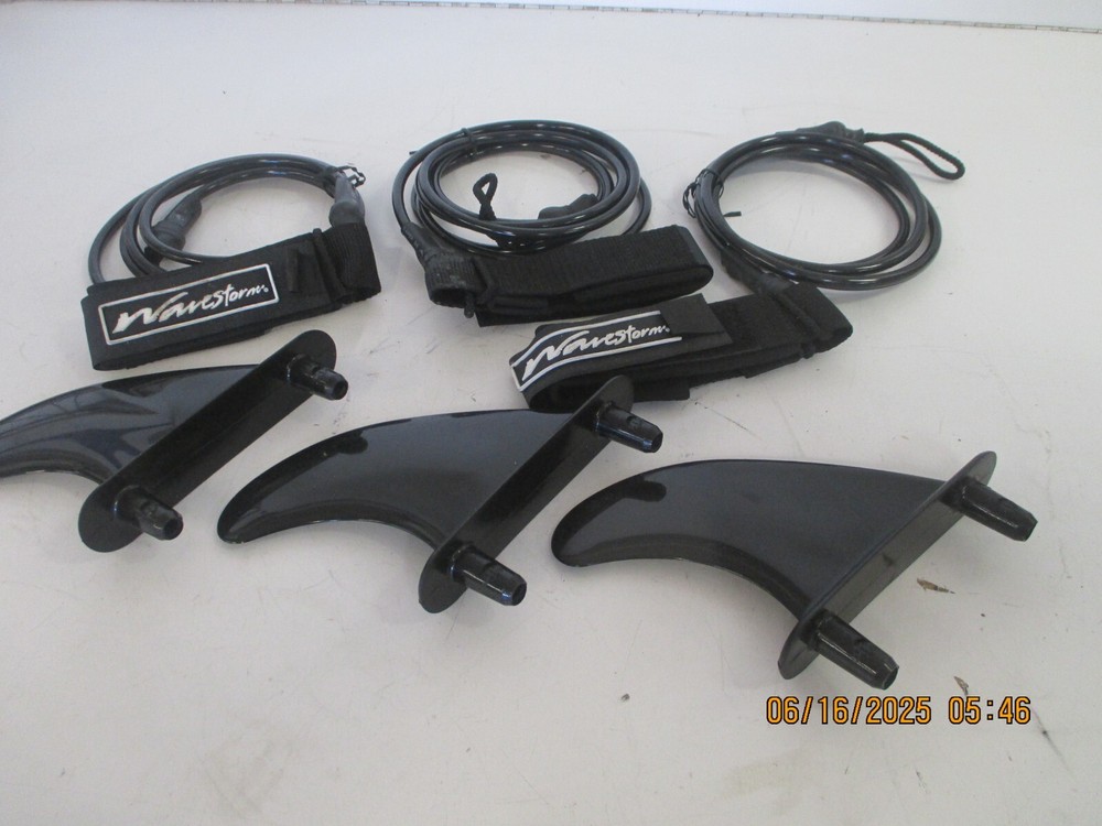 Wave Storm and Soft Top Surfboard Fin Set and Leashes.