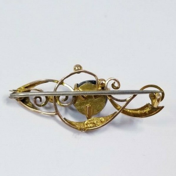 EATON'S VINTAGE BROOCH