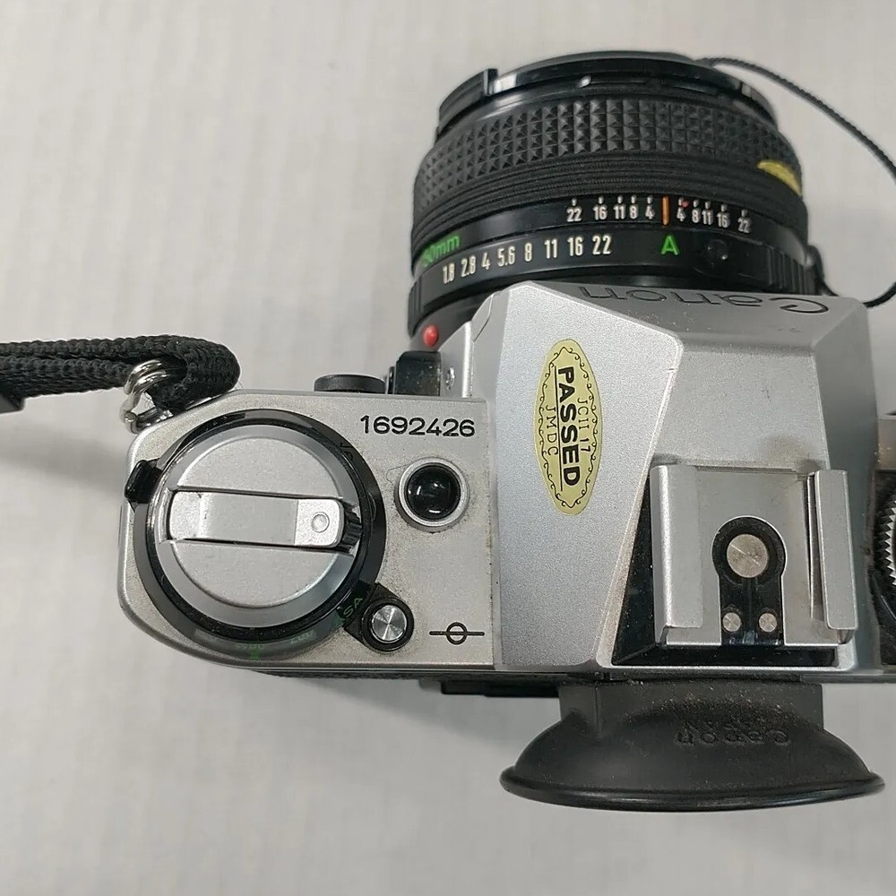 Canon AE-1 Program 35mm Camera Bundle With 50mm / 135 Lens Strap & Camera Bag