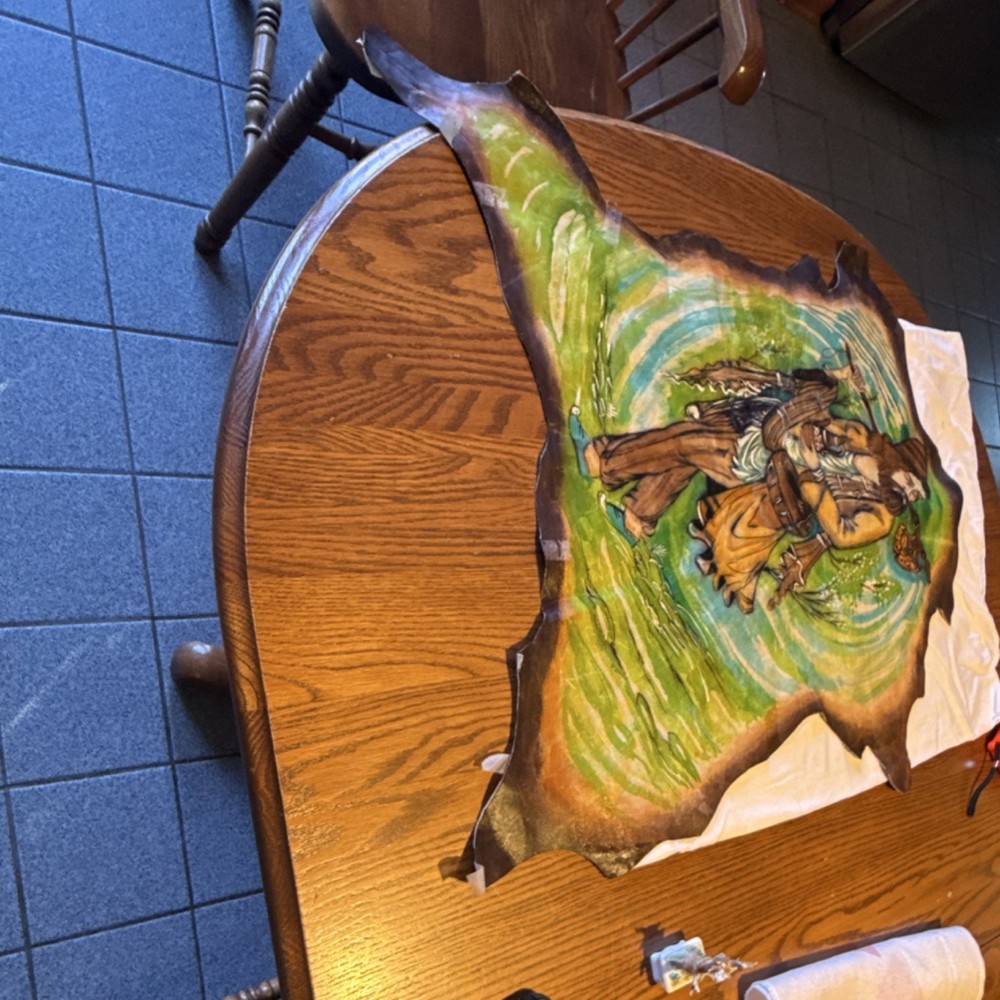 Hand-Painted Middle Eastern Hide Art with Figure in Traditional Attire