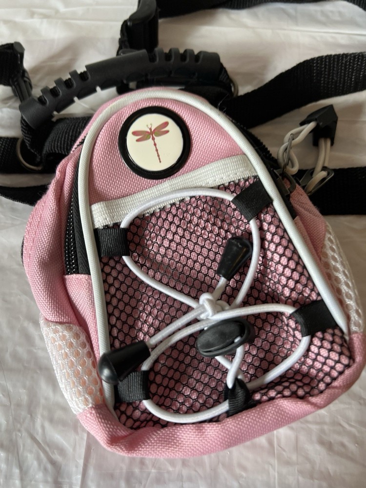 MINI DAY PACK pink with Flower logo adjustable strap.