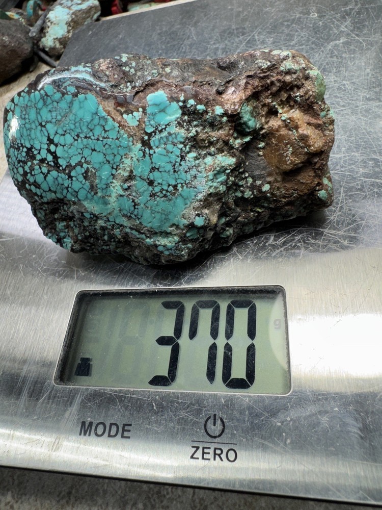 Hubei turquoise stabilized nugget solid spiderwebs all the way through