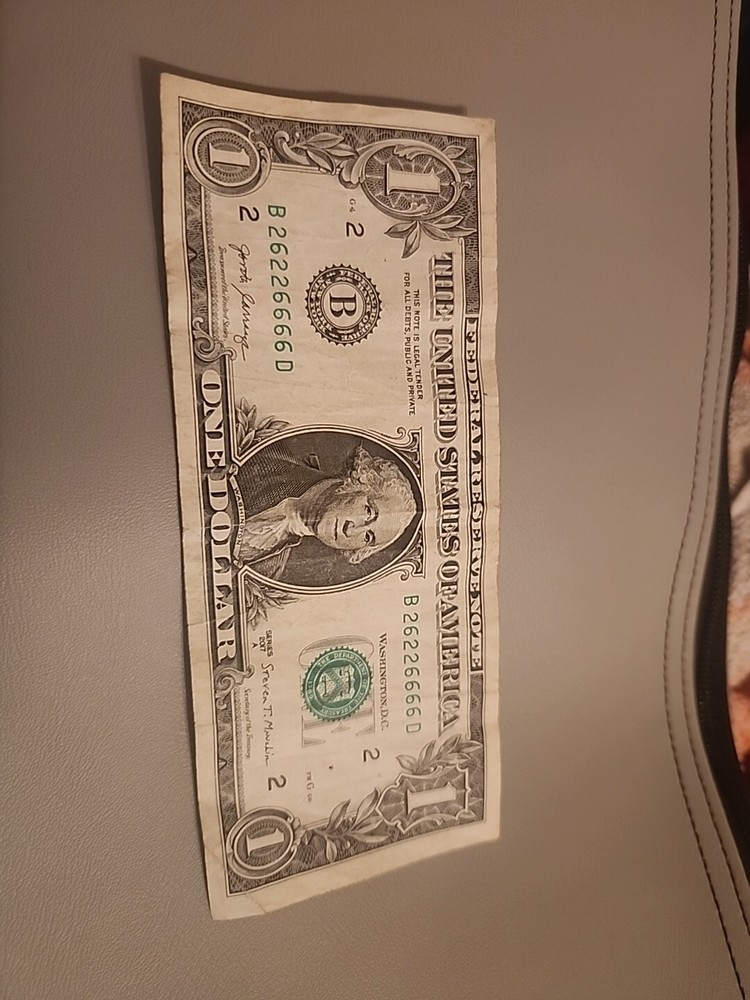 fancy serial number 1 dollar bill binary