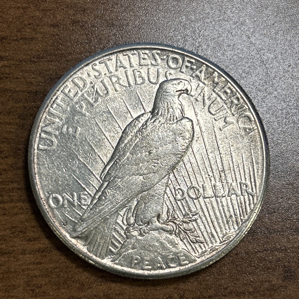 1925-S $1 Peace Silver Dollar AU+