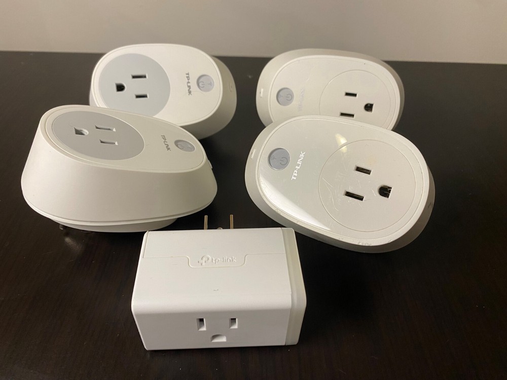 Four TP-Link Smart Wi-Fi Plug in Socket Controllers