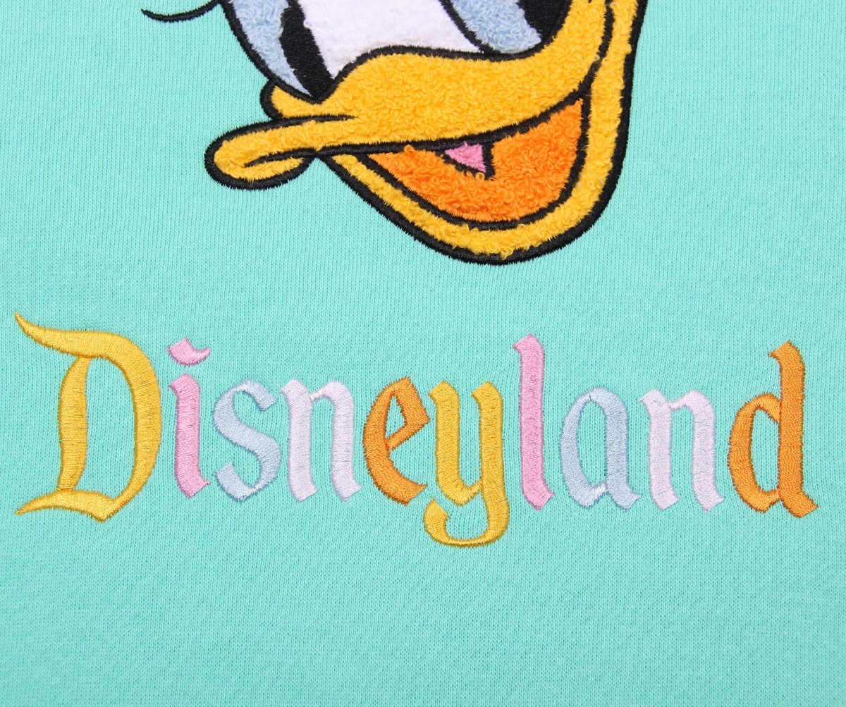 2025 Disneyland Daisy Duck Embroidered Turquoise Crewneck Sweatshirt Size M