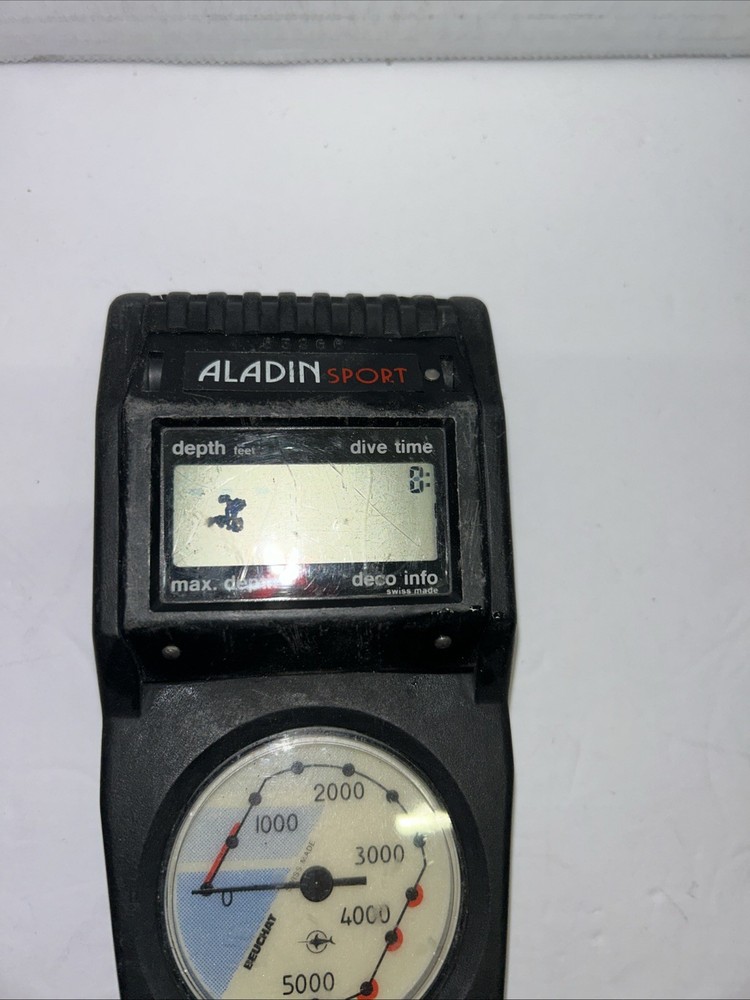Aladin Dive Computer Console. Beuchat Pressure Gauge. Read.