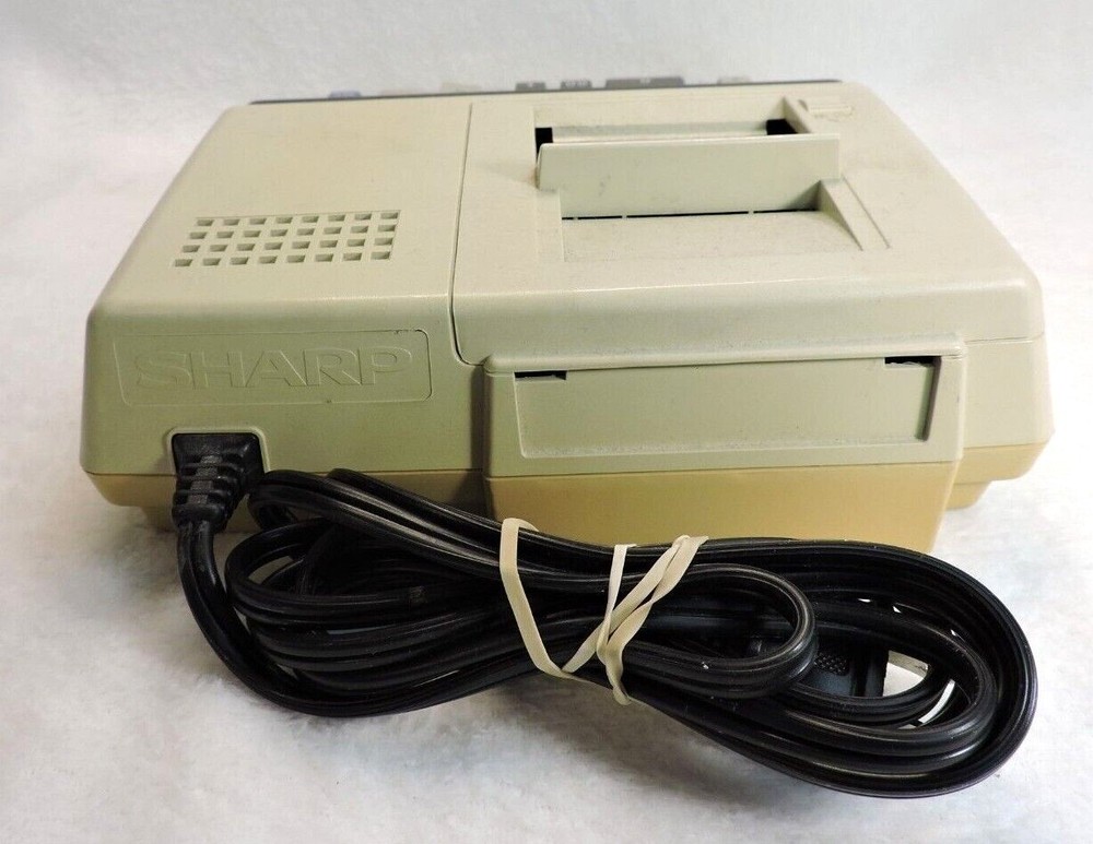 VINTAGE SHARP ELECTRONIC CALCULATOR (7D161471) W/2 PAPER SPOOLS - USED**