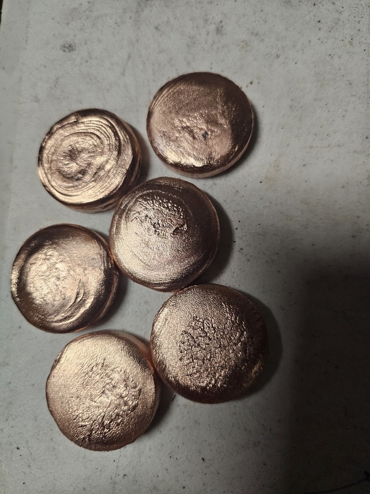 Hand Poured  Copper Round Between 2-3 ounces Each.