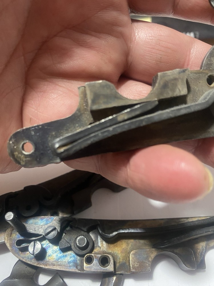 CVA Frointier Muzzleloader Lock and two screws.