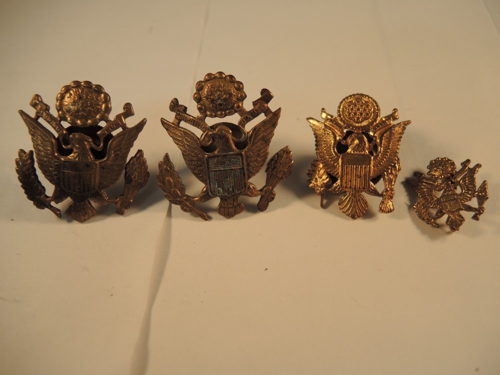 3 Army cap devices, 1 overseas cap device pre WW II