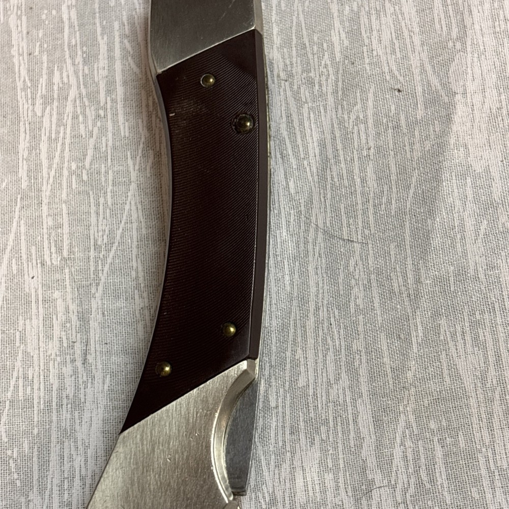 SHARP SABRE U.S.A Kinfe With Leather Covering.