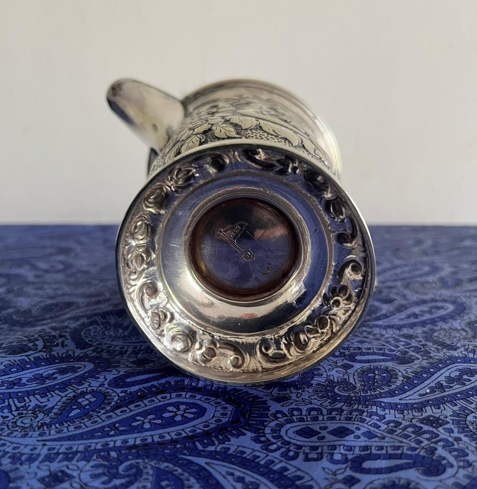 A lovely looking Antique Walker & Hall Silver Plated Cream Jug