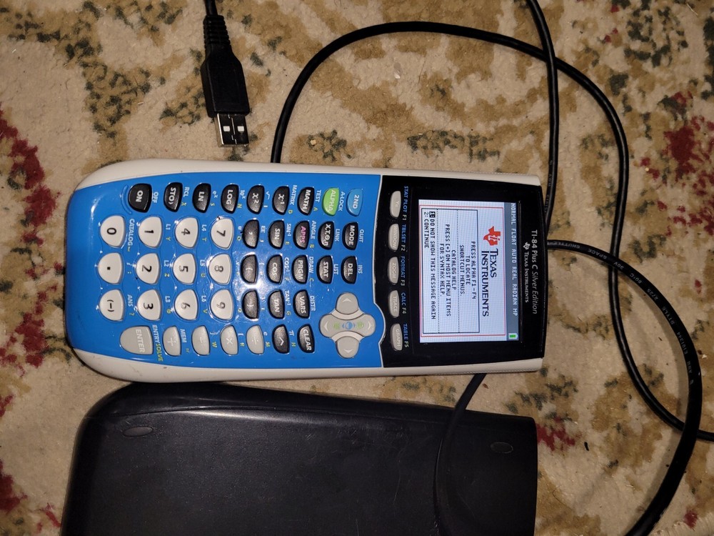 Texas Instruments TI-84 Plus C Silver Edition Handheld Graphing Calculator used