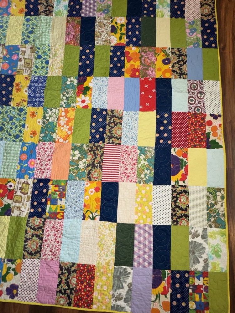 handmade multicolored cotton patchwork quilt featuring a reversible design7by7.5
