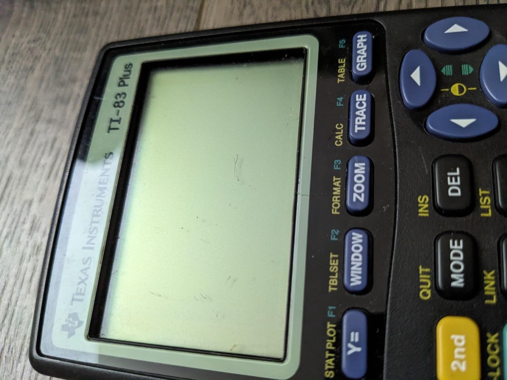 Texas Instruments TI-83 Plus Graphing Calculator With Cover