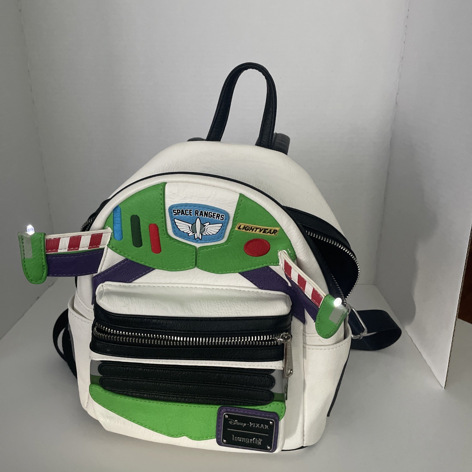 Loungefly Disney Pixar Toy Story Buzz Lightyear Wings Light up Mini Backpack