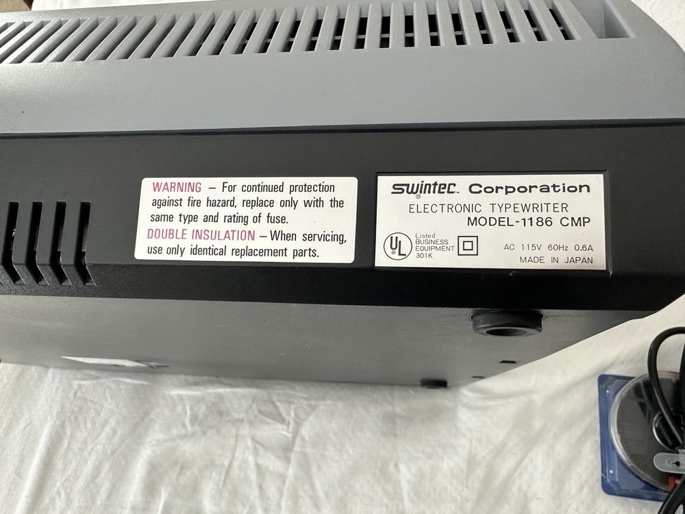 Swintec 1186 CMP Electronic Typewriter with extra daisy wheels