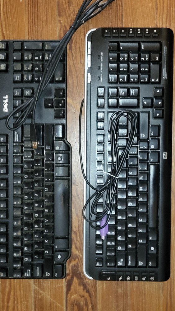 2 KVM, cables, trackball, 2 keyboards