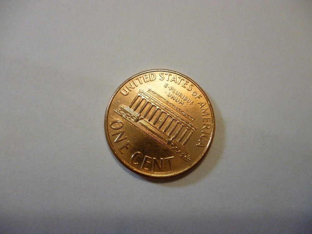 2000 penny, Floating roof coin