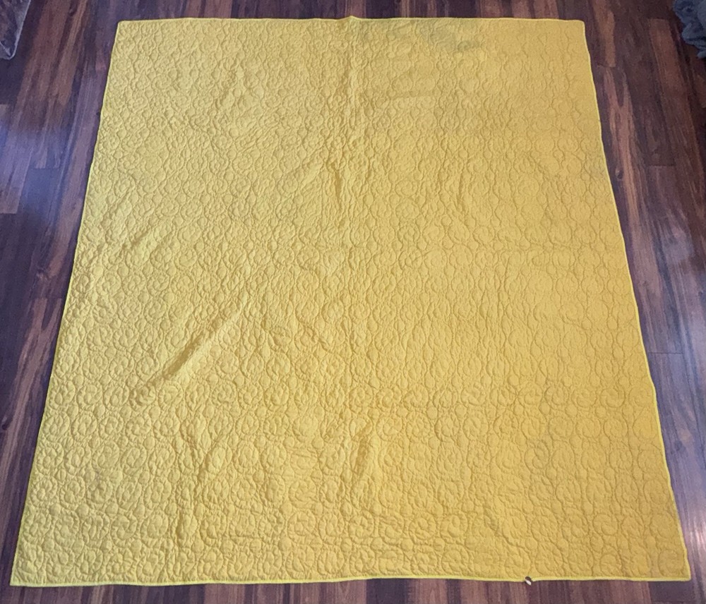 handmade multicolored cotton patchwork quilt featuring a reversible design7by7.5