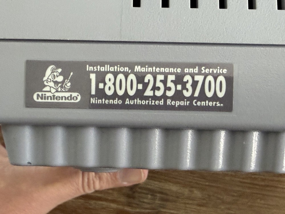 PRISTINE SNS-001 Console w/ Super Mario World & Manual + Controller & Cords
