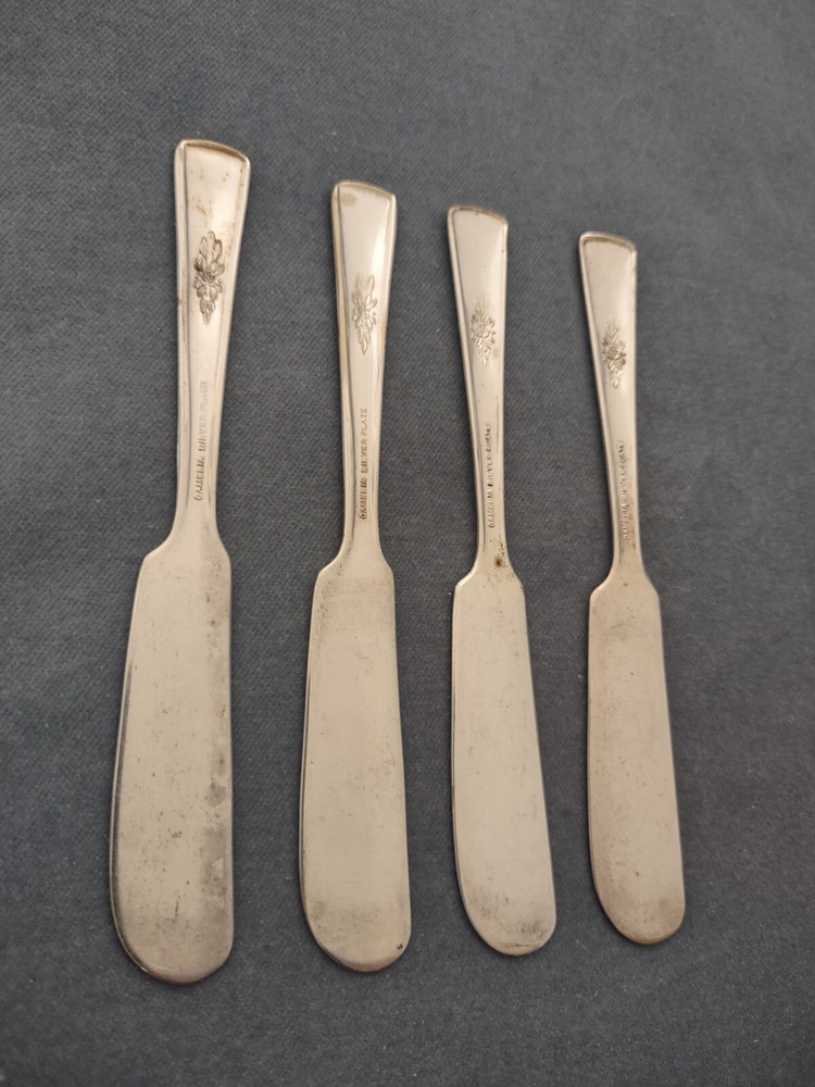4 Silverplate Butter Spreaders International Silver Camelia pattern