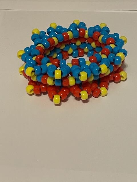 Primary colored mini kandi cuff. PLUR bracelet