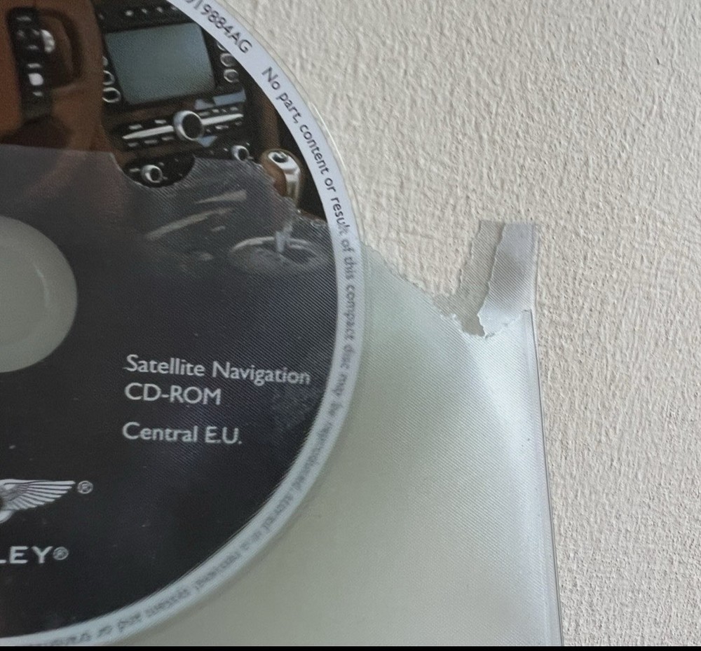 2004 Bentley Continental GT 7 Navigation Disc Set & Bentley Disc Case.