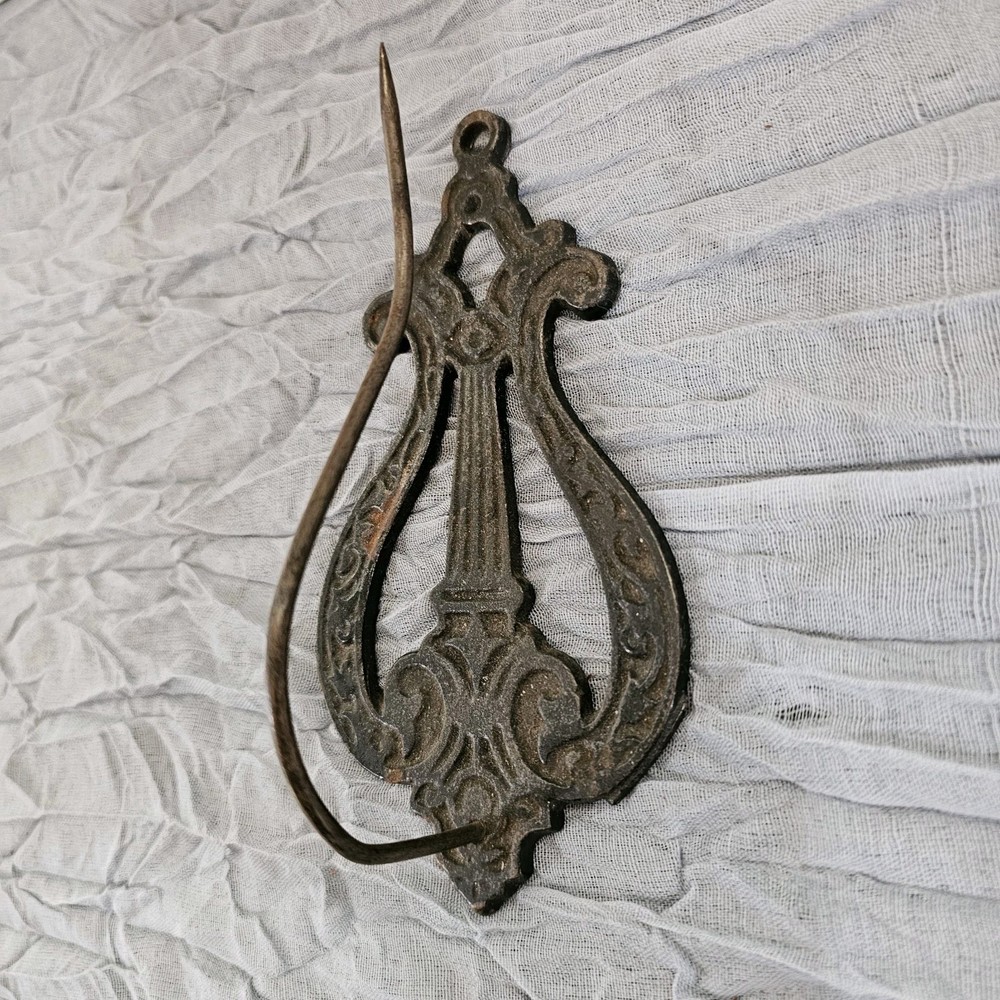 Antique cast metal, wall mount, spiked nail note holder