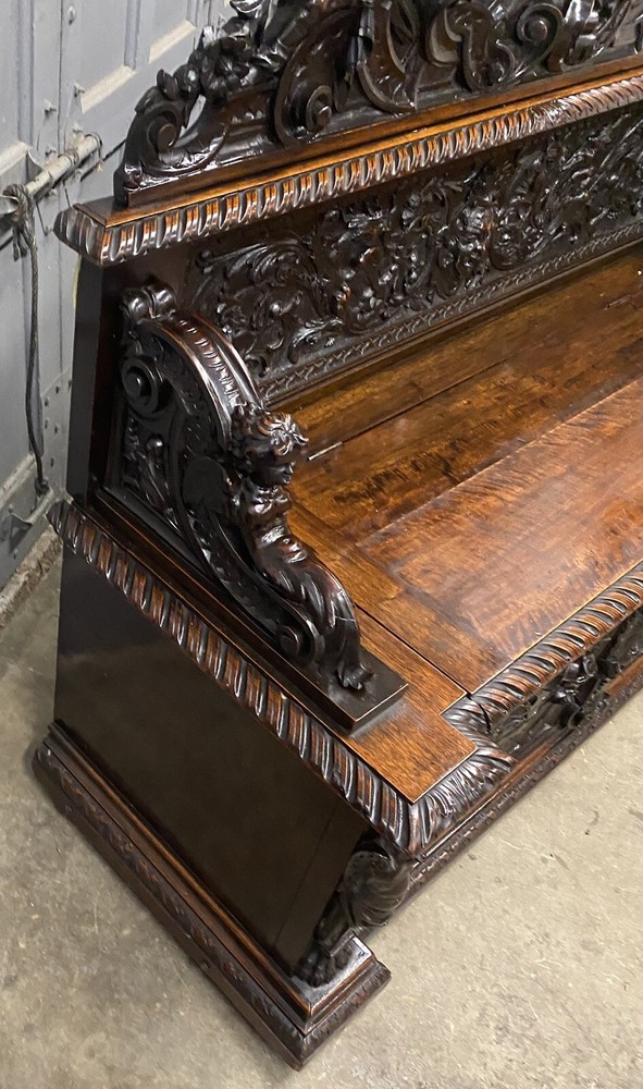 CARVED FIGURAL WALNUT BENCH
