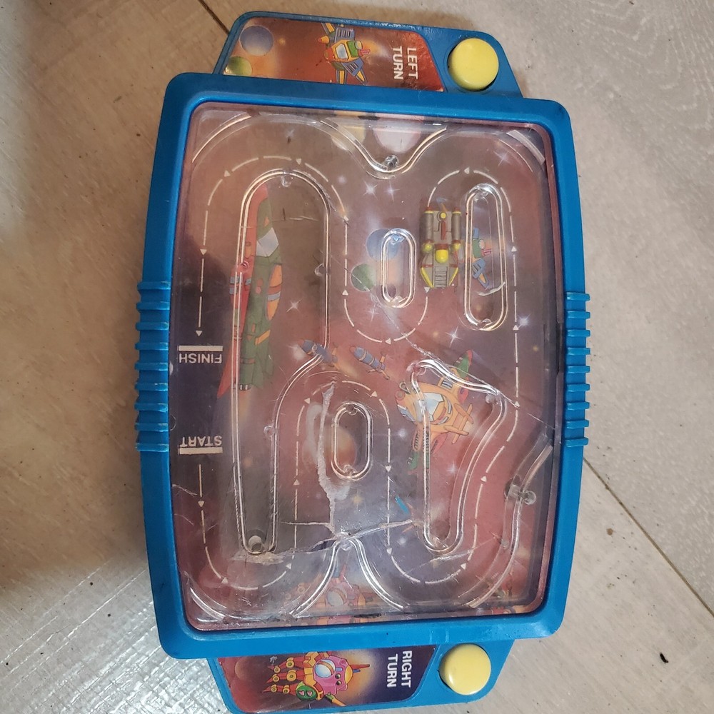VINTAGE 1991 SOMA SPACE SHIP HAND HELD VIBRATING GAME