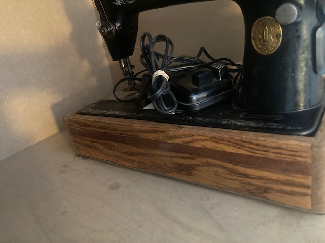 Solid oak and walnut sewing machine bases, custom built to fit your machine.