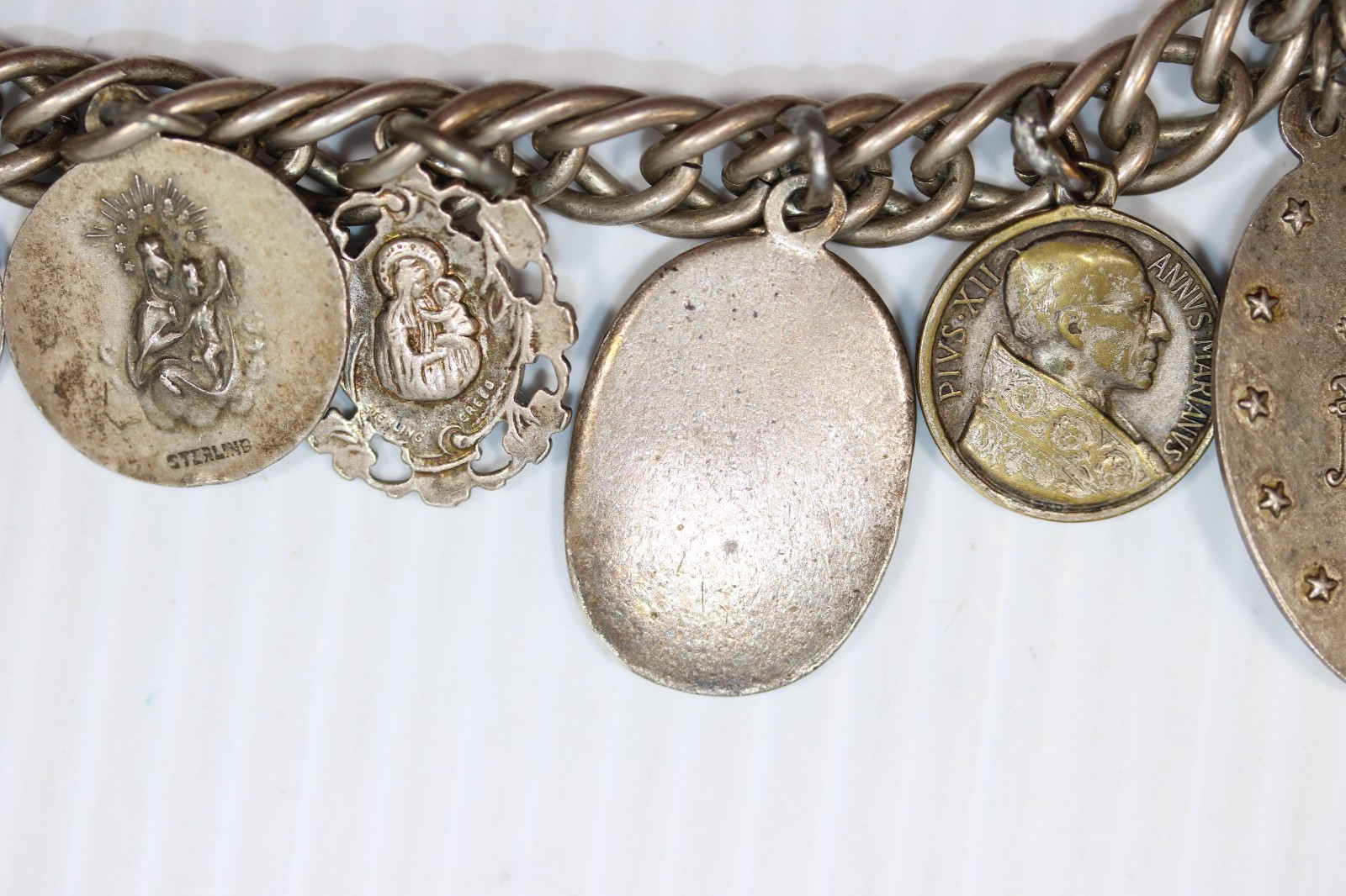 Vintage Sterling Silver Saint Charm Bracelet featuring 13 Medals 60g #450