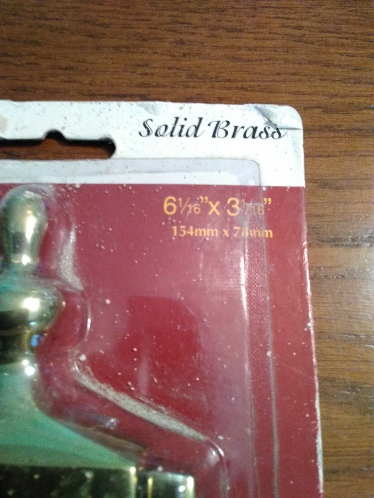 Brass Door Knocker. Unopened, but packaging rough. Solid.