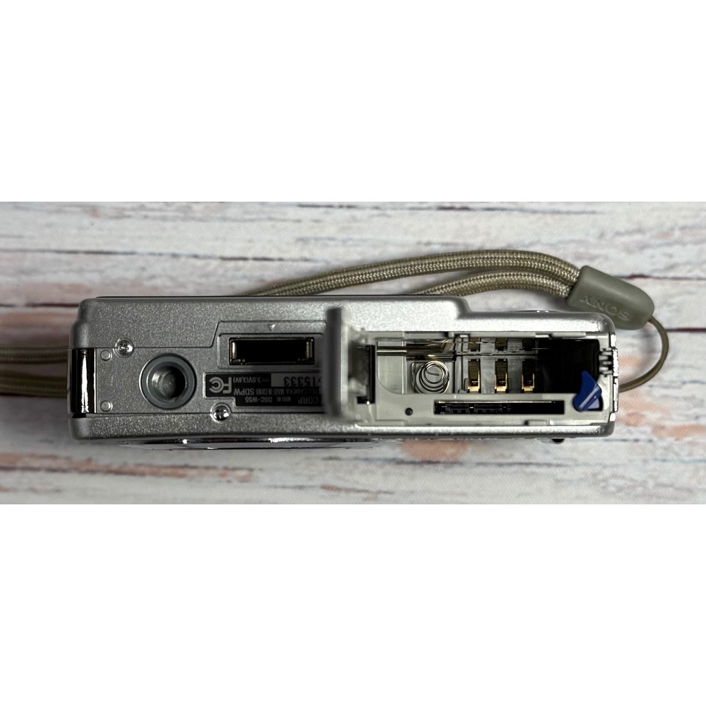 Sony Cyber-shot DSC-W55 7.2MP Digital Camera Silver Bundle with Case and Memory