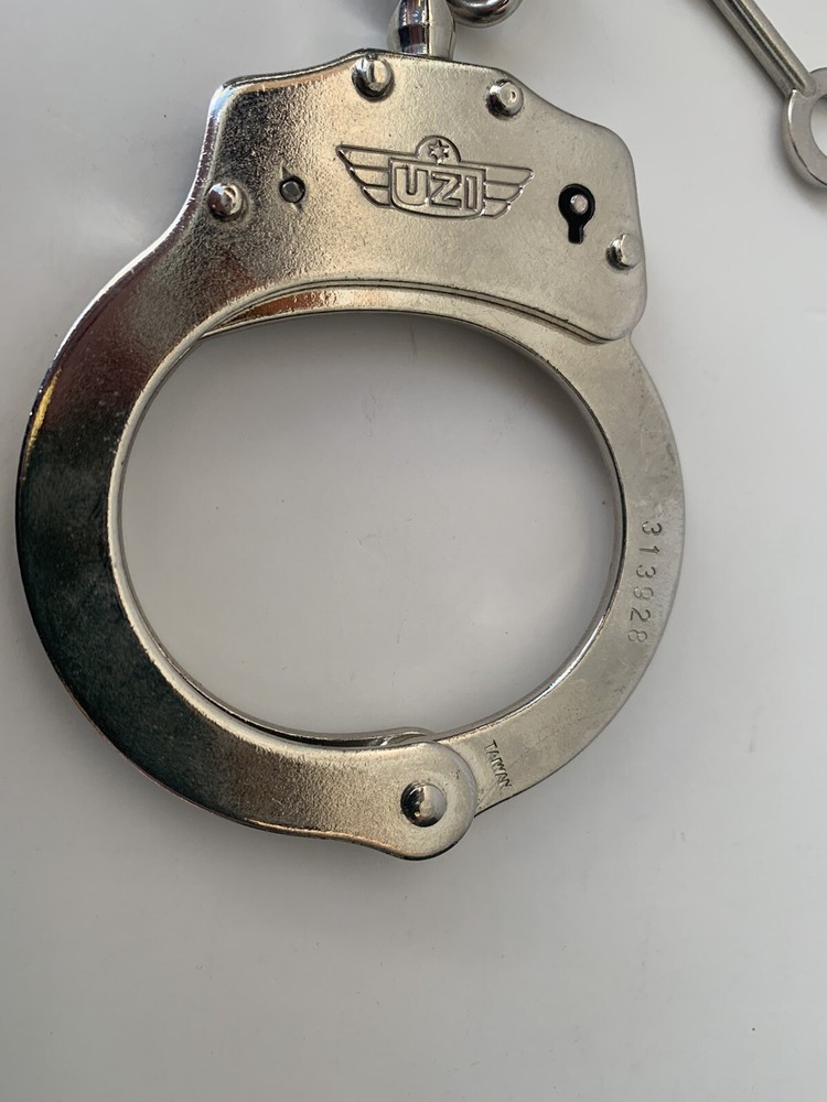 Used UZI Chain Link Handcuffs
