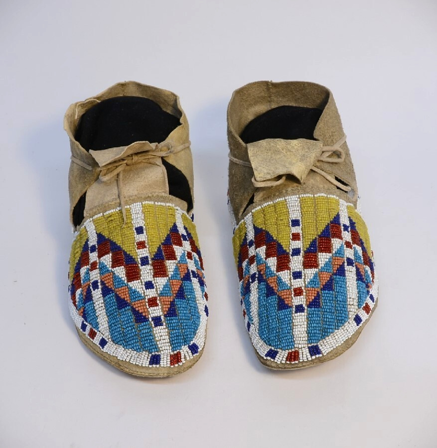 Antique Sioux Moccasins, painted parfleche interior soles