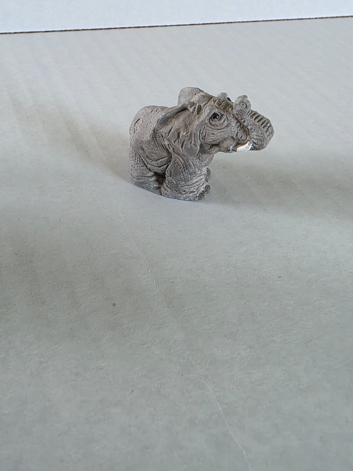 Three elephant figurines