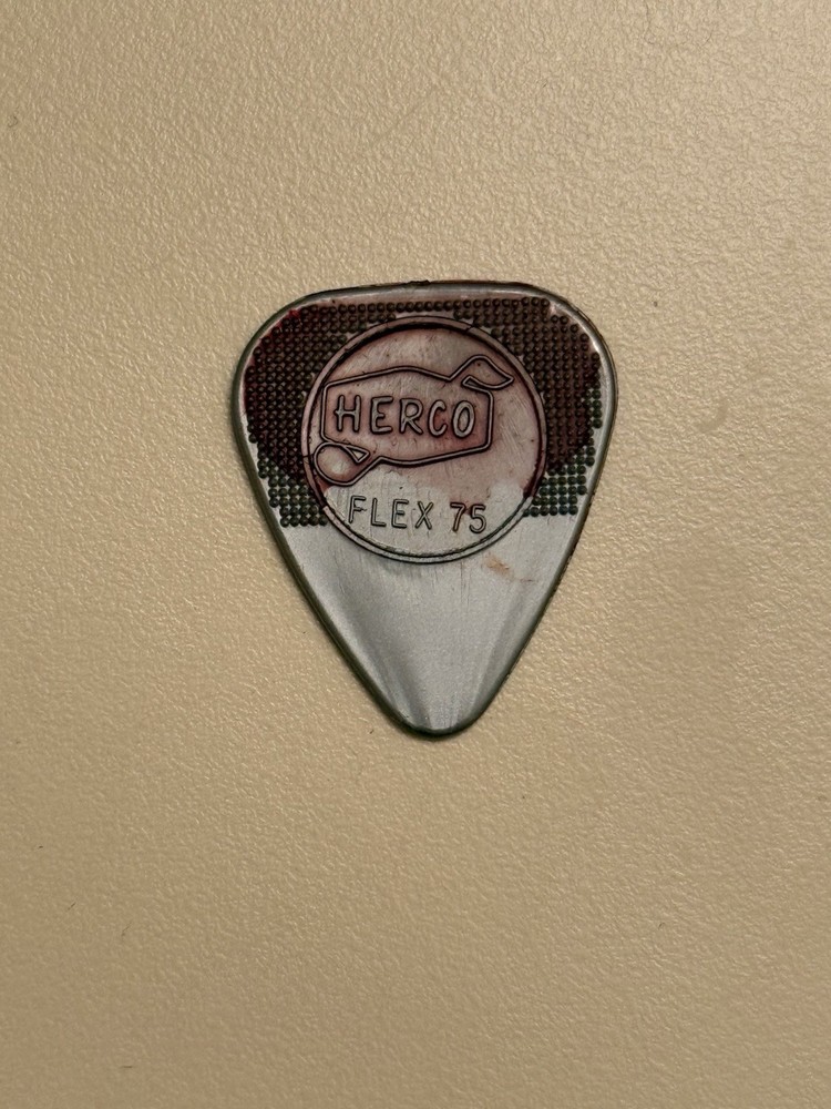KISS 1996 Guitar Pick GENE SIMMONS Blood Stained  Bass Solo Stage Used Plectrum