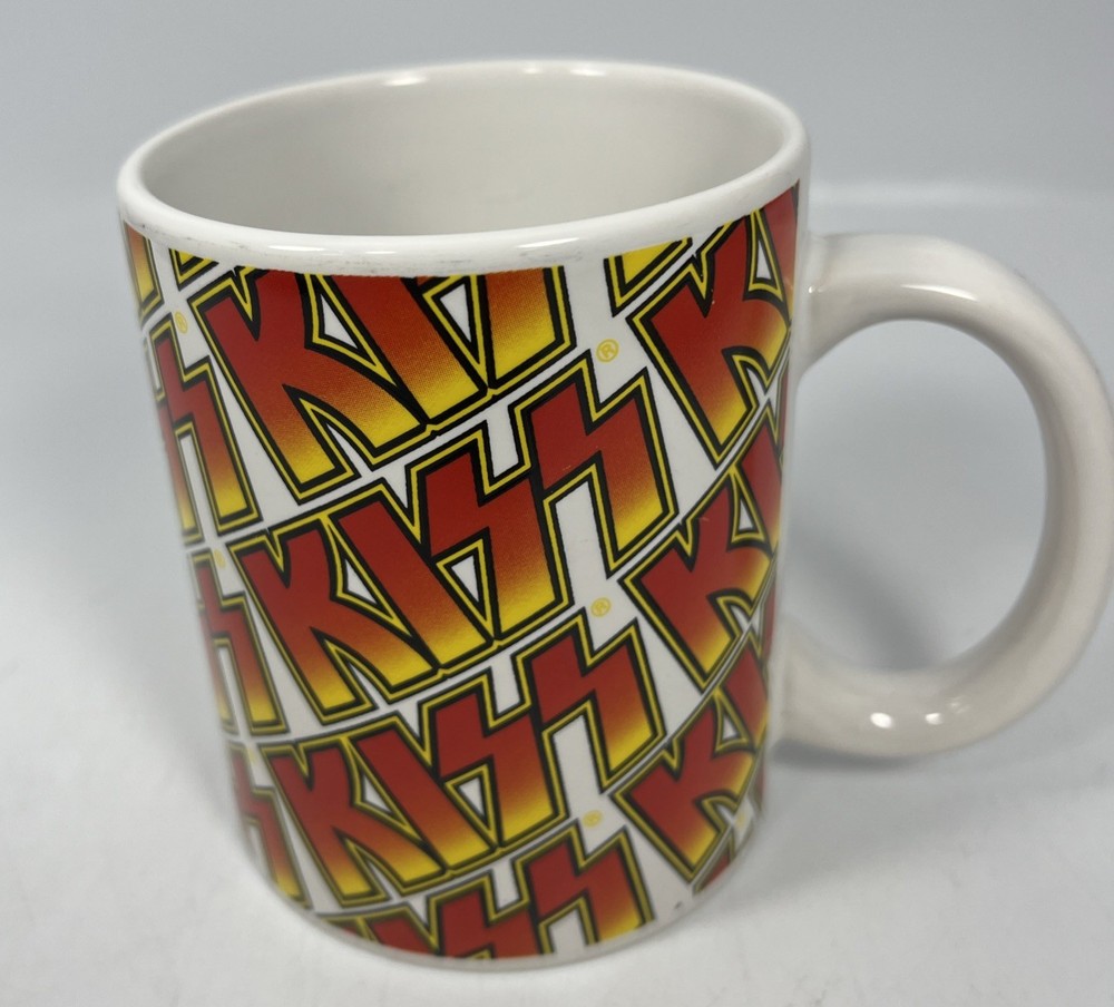Rock Express KISS Band Orange Yellow Logo Coffee Mug Catalog Ltd 2008