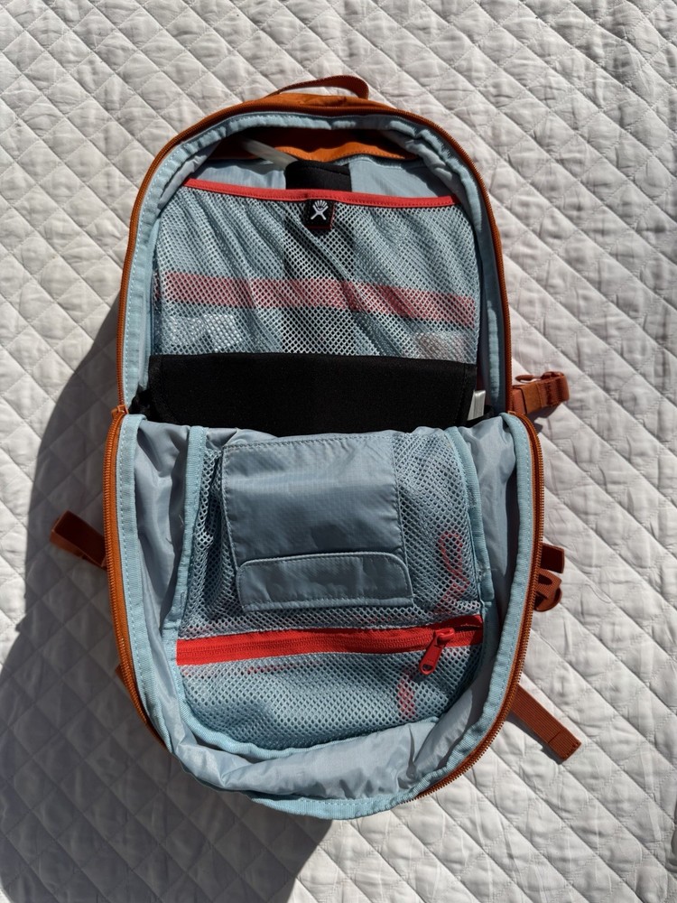Hydro Flask Down Shift Hiking Backpack 14 Liter Hydration Day Pack Bronze Orange