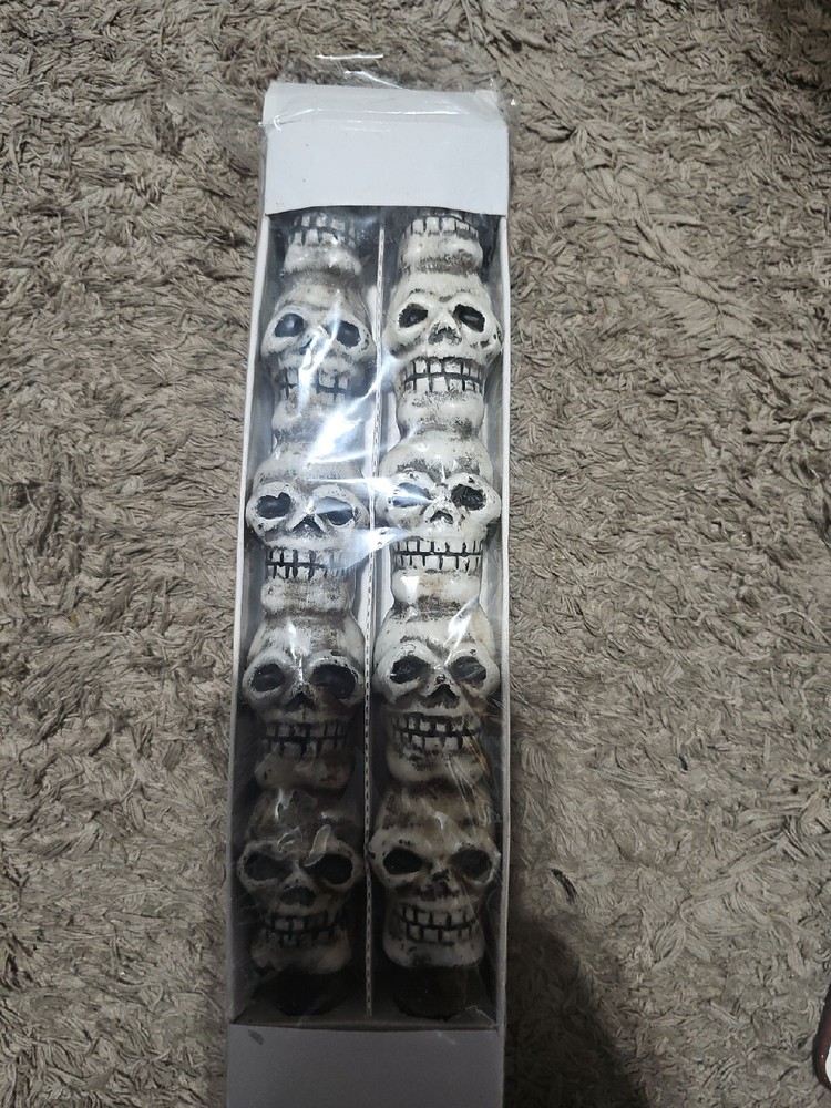 Skull stick candles.