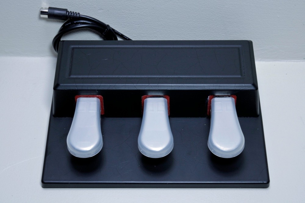 * Three Pedal Piano-Style MIDI Controlled Footswitch *