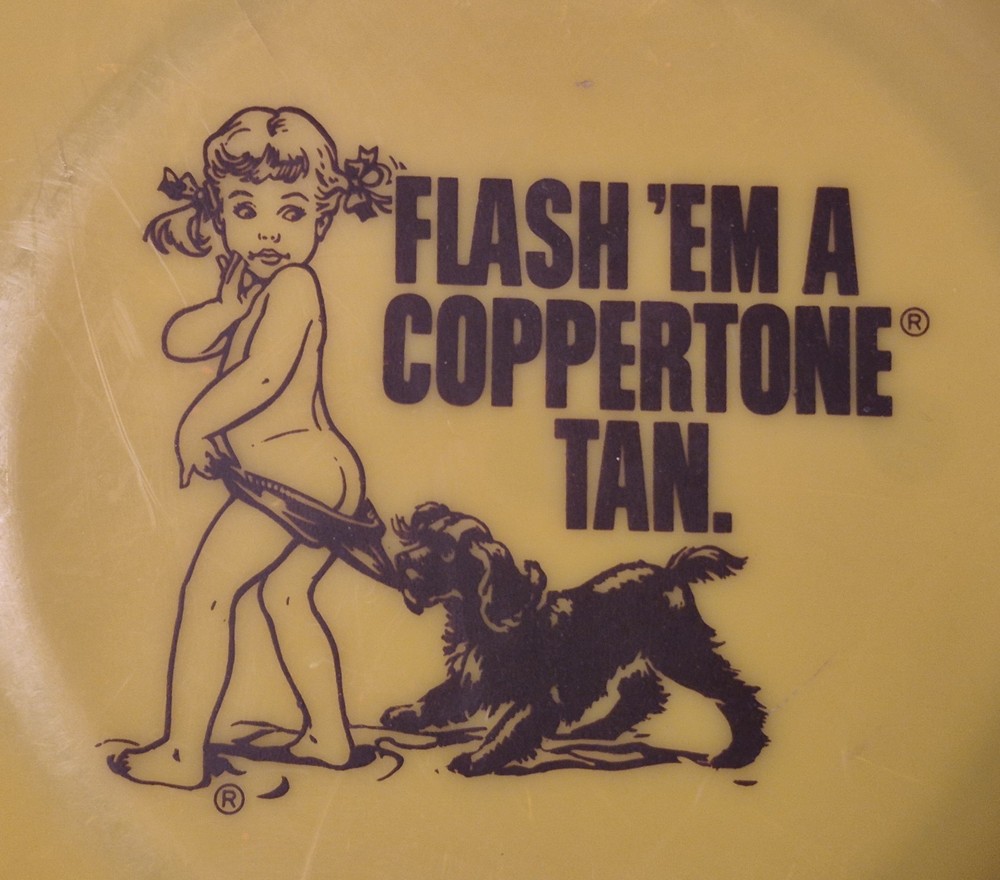 Flash em a Coppertone Tan Flying Disc Frisbee